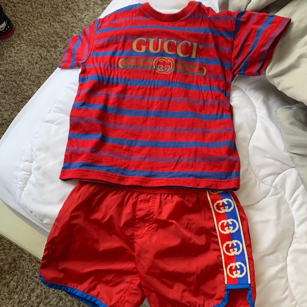 Gucci swimming trunks and shirt